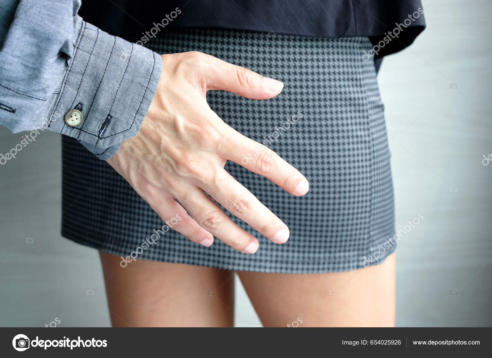 Man's Hand Catches Woman's Ass Leg Office Girl Sexually Abusing Stock Photo  by ©Seasonpost 654025926