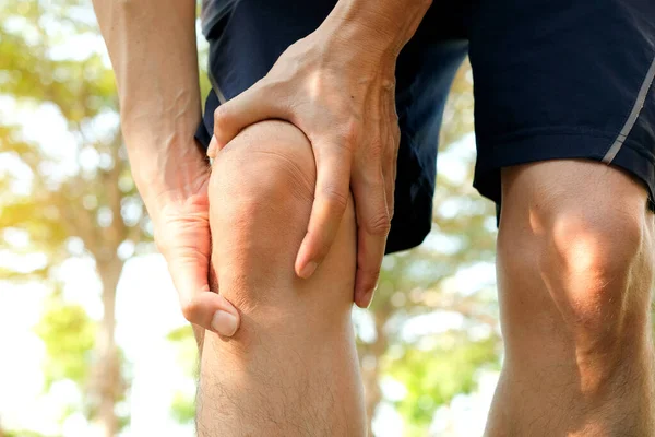 Knee Pain Man Stand Park Her Hand Caught Knee Having — Stock Photo, Image