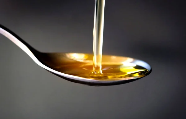 Pouring Olive Oil Spoon Kitchen Prepare Cooking Concept Healthcare Beauty — Fotografia de Stock