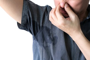 Erkekler beyaz kollar giyer, kollar koltuk altlarıyla kaplıdır, terler kirli ve kirlidir. Sağlık hizmeti kavramı