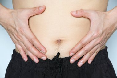 Erkeklerin mide ağrıları var. Girişimci ya da girişimci, sağlık ve tıbbi kavramlar yüzünden..