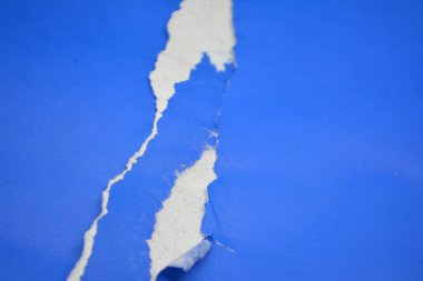 Mavi yırtık kağıt arka plan dokusu