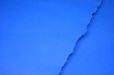 Mavi yırtık kağıt arka plan dokusu