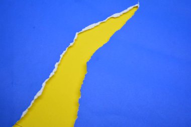 mavi ve sarı yırtık kağıt arkaplan dokusu