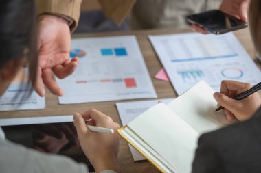 Marketing, Financial, Accounting, Planning, Team of business use calculators and graph analysis to plan marketing strategies and make profitable investments for the company.