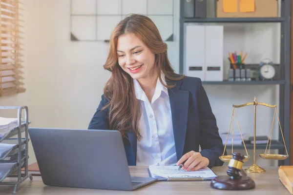 Law, consult, contract, contract. Female lawyer in black suit Consulting on lawsuits, signing contracts, being a lawyer accepting complaints for clients in a lawyer's office lawyer concept