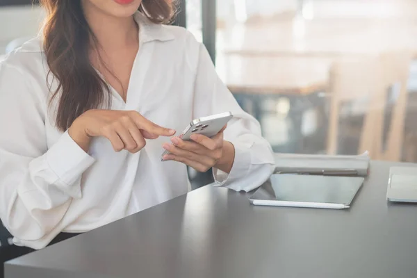 stock image Marketing, Financial, Accounting, Planning, businesswomen uses a mobile phone to contact a customer to inform her of the company is business partnership.