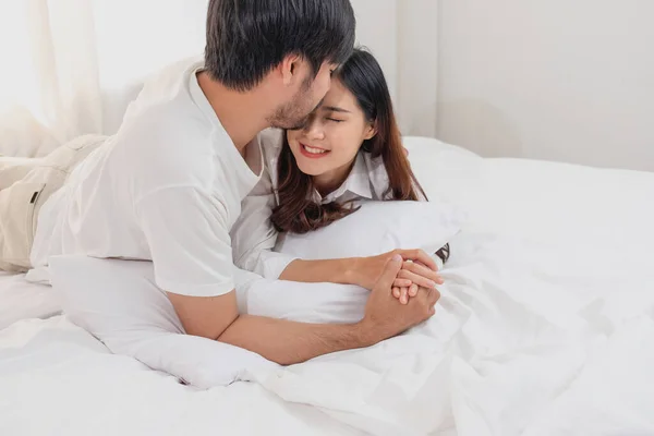 Happy Young Asian Couple Embracing Teasing Playing Cheerfully Bed Home — Stock Photo, Image