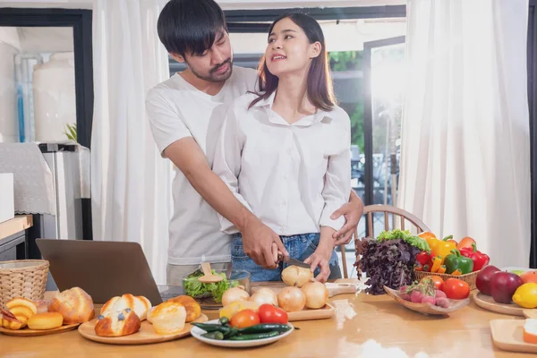 Young Asian Couple Cooking Fruits Vegetables Using Laptop Kitchen Cook — Stock Photo, Image