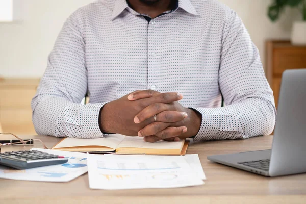 stock image African American businessman smiling relaxed and crossed arms after analysis and research at home office