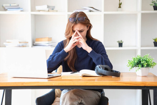 Concept Burnout Syndrome.  A woman feels uncomfortable working. Which is caused by stress, accumulated from unsuccessful work And less resting body. Consult a specialist psychiatrist.