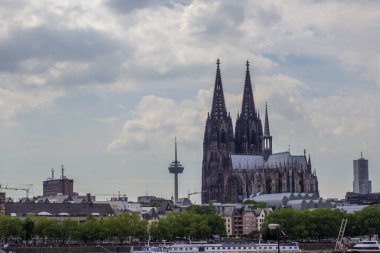 Cityscape of Cologne with Hohenzollern bridge, thedral, Saint Martin church and Rin river in Germany