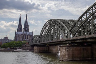 Cityscape of Cologne with Hohenzollern bridge, thedral, Saint Martin church and Rin river in Germany