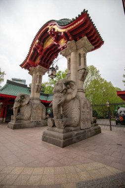 Stone elephants and the arched entrance to the Berlin Zoological Garden, Germany clipart