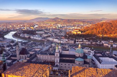 Scenic view of the city against the backdrop of mountains at sunset. Salzburg. Austria.