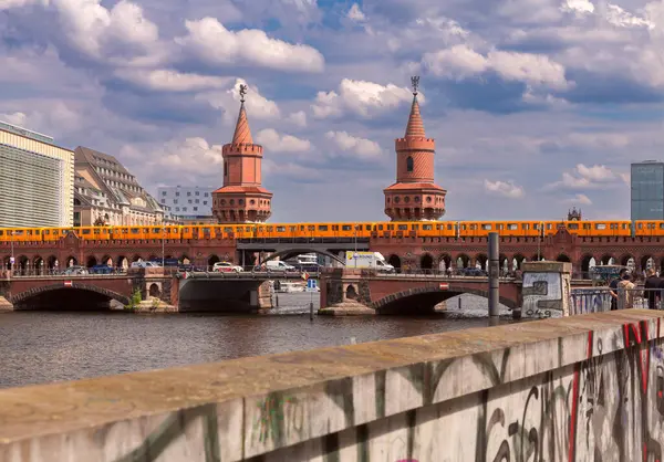 stock image Berlin, Germany - May 21, 2024: The famous old Oberbaum Bridge with metro trains and cars passing over it