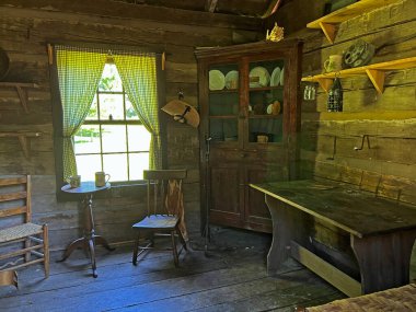 The kitchen Inside Historic Lower Residence in the recreated and restored 1800 Pioneer Village at Spring Mill State Park, near Mitchell, Indiana. clipart