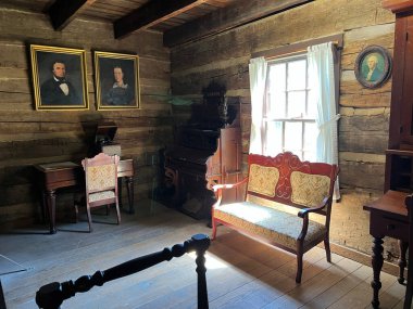 :  Inside Historic Lower Residence in the recreated and restored 1800 Pioneer Village at Spring Mill State Park, near Mitchell, Indiana. clipart