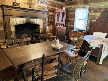 Inside Historic Lower Residence in the recreated and restored 1800 Pioneer Village at Spring Mill State Park, near Mitchell, Indiana. clipart