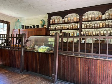 Historic Apothecary in the recreated and restored 1800 Pioneer Village at Spring Mill State Park, near Mitchell, Indiana. clipart