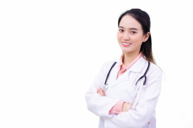 Young beautiful Asian woman doctor standing with arms crossed happy and smile in hospital wearing a white robe and stethoscope isolated on white background.
