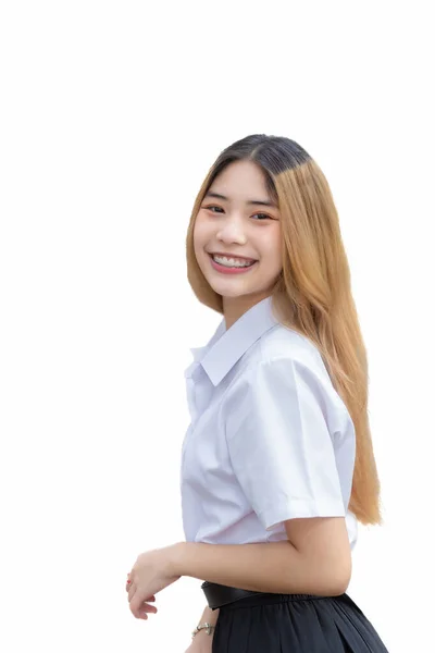 大学生の制服姿の大人タイ人学生の肖像 アジアのかわいいです女の子立ちますとともに彼女の手保持顔自信を持って上の白い背景 — ストック写真