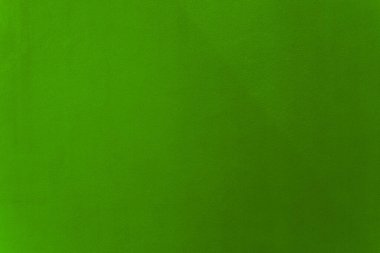 Arka plan olarak çimento duvar dokusunda yeşil ve açık yeşil boya..