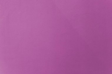 Arka plan olarak çimento duvar dokusunda pembe ya da pembe boya var.