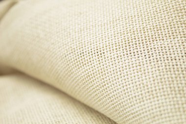 Kumaşın dokusu makroyu ve fotoğrafı eritiyor. Yakın çekim, makro fotoğraf. Yumuşak odak resmi.