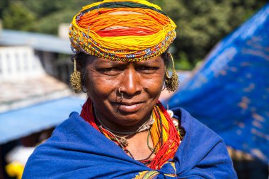 Bastar, Chhattisgarh, India / November 25, 2021: Portrait of a Bonda tribal woman at Haat (weekly) market.