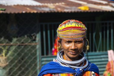 Bastar, Chhattisgarh, India / November 25, 2021: Portrait of a Bonda tribal woman at Haat (weekly) market.