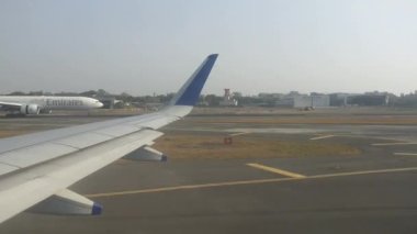 A passenger plane prepares to take off from the runway at Chhatrapati Shivaji International Airport, in Mumbai, Bombay, India. 