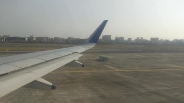 A passenger plane prepares to take off from the runway at Chhatrapati Shivaji International Airport, in Mumbai, Bombay, India. 
