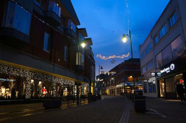 Christmas lights in the shopping precinct during blue hour on Wide Bargate in Boston Lincolnshire UK