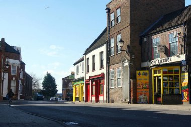 Empty High street with European shops during the coronavirus outbreak on High St in BOSTON Lincolnshire,.
