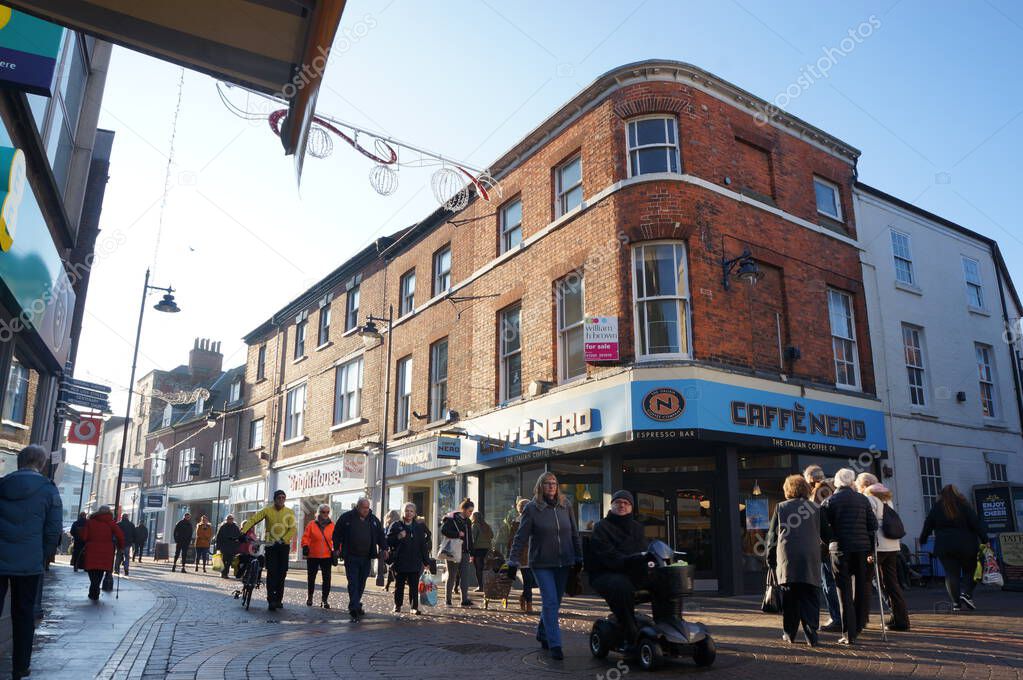People Christmas shopping in the town precinct with Cafe NERO in the background. BOSTON Lincolnshire,