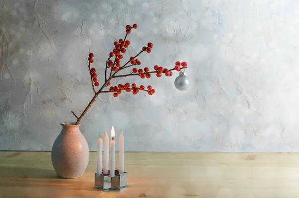 Minimalist First Advent Four Small Candles One Burning Berry Branch — Stock Photo, Image