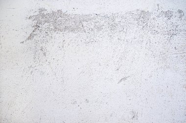 Alçılı duvar yüzeyi beyaz boya ile ovalanmış, şehir teması veya mimarisi için açık gri arkaplan dokusu, tam çerçeve, kopyalama alanı