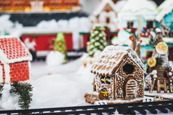 Gingerbread houses. Toy train made of gingerbread. Christmas.