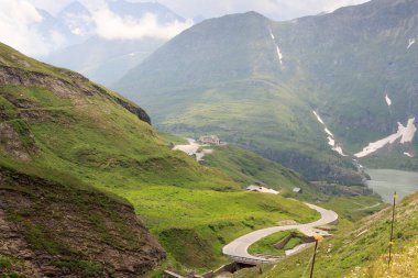 Mountain panorama with mountain inn Glocknerhaus and hairpin curves at Grossglockner High Alpine Road, Austria