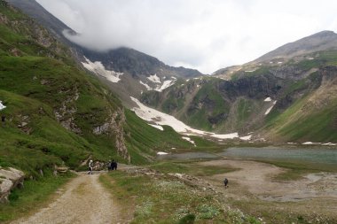 Mountain panorama with reservoir Nassfeldspeicher near Grossglockner High Alpine Road, Austria