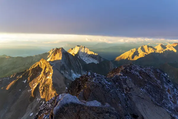 stock image Panorama view of mountains with summit Hohe Weisse in Oetztal Alps seen from summit Hochwilde during sunrise in Texel group, South Tyrol, Italy