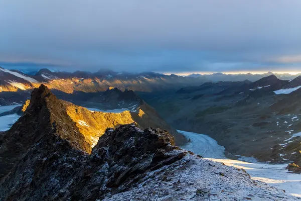 stock image Panorama view of mountains and glaciers in Oetztal Alps with north summit of Hochwilde seen from south summit of Hohe Wilde during sunrise in Texel group, South Tyrol, Italy