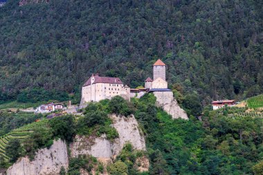 Tyrol Castle (Schloss Tirol) and vineyards in the mountains of Tirol (Dorf Tirol) in South Tyrol, Italy