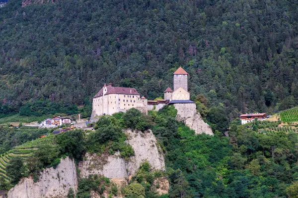 Tyrol Castle (Schloss Tirol) and vineyards in the mountains of Tirol (Dorf Tirol) in South Tyrol, Italy