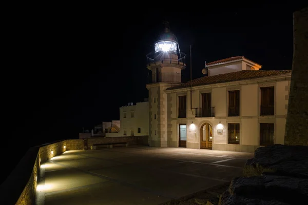 Lighthouse at night in Peniscola, Castellon, Spain