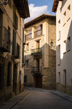 Traditional stone buildings on the streets of Rubielos de Mora, Teruel, Spain, Europe clipart