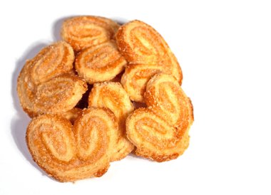 Beyaz arka plana karşı domuz kulağı, pasta