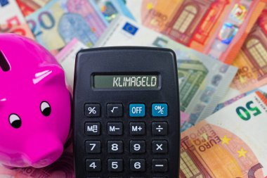 Klimageld yazısıyla hesap makinesi