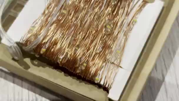Copper Christmas String Lights Csomagolt Szépen Egy Dobozban — Stock videók